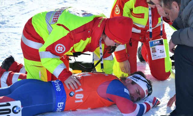 Emil Hegle Svendsen from Norway receiving medical treatment at the finish line during the men's 10 km sprint at the Biathlon World Cup in Hochfilzen, Austria, 11 February 2017. Photo: Martin Schutt/dpa-Zentralbild/dpa